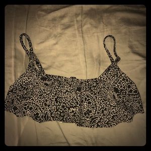 I’m selling a black and white bikini top.